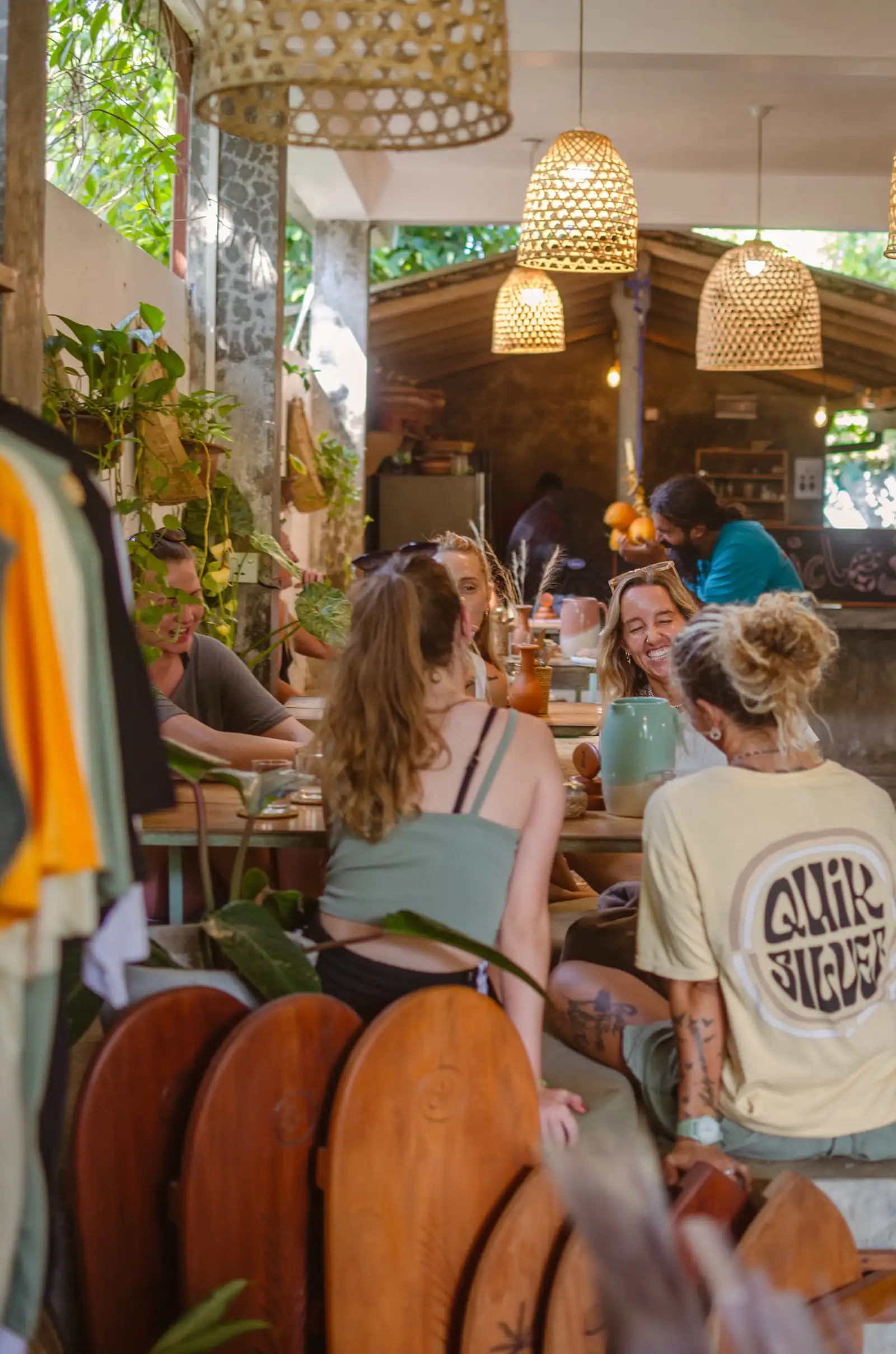 People sharing coffee and breakfast at Flow Café, Weligama